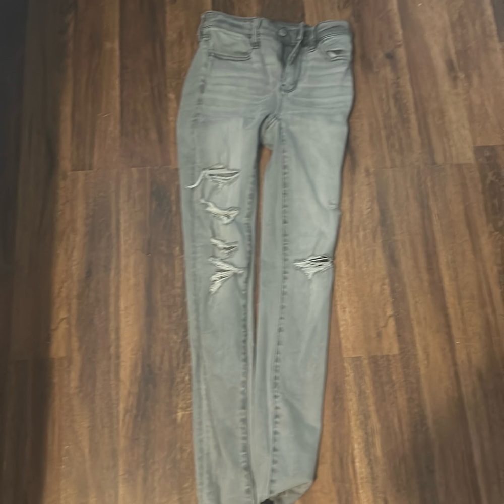 Light grey ripped skinny jeans